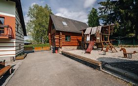 Srubové apartmány Rak